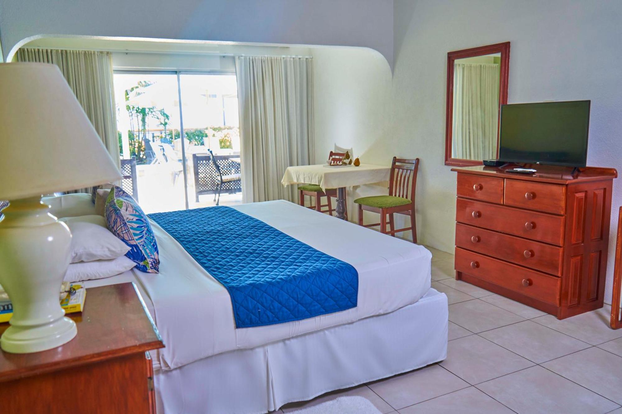 Tropical Sunset Beach Apartment Hotel Saint James Szoba fotó